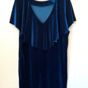 never worn. still has tags. has a little button to show less chest if wanted